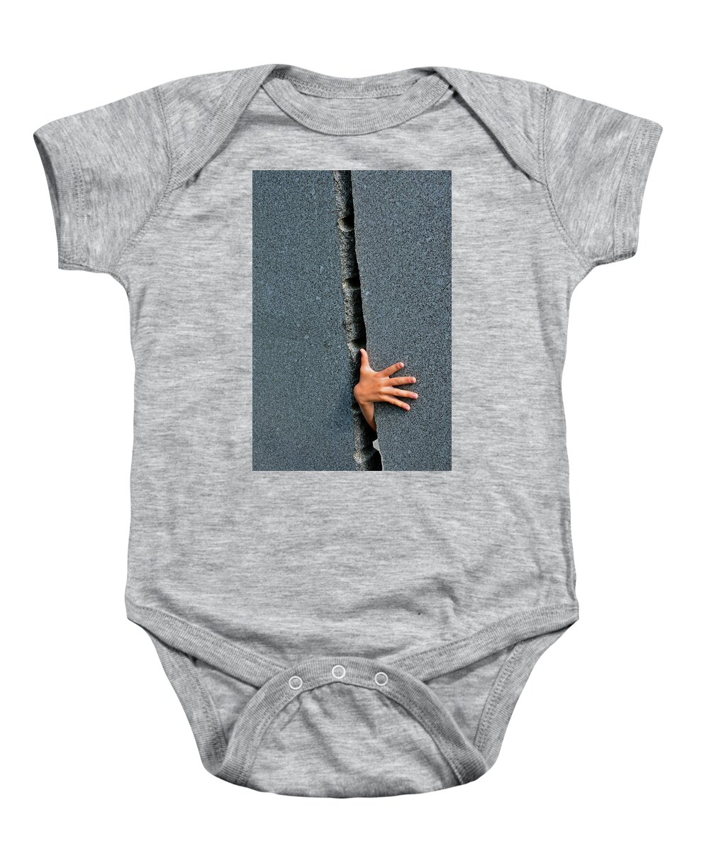 Hand Baby Onesie featuring the photograph Breakthrough by Andreas Berthold