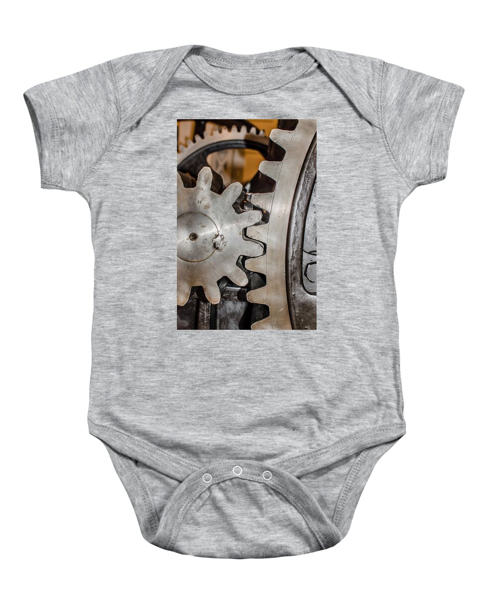 Cogwheels Baby Onesie featuring the photograph Cause And Effect by Andreas Berthold