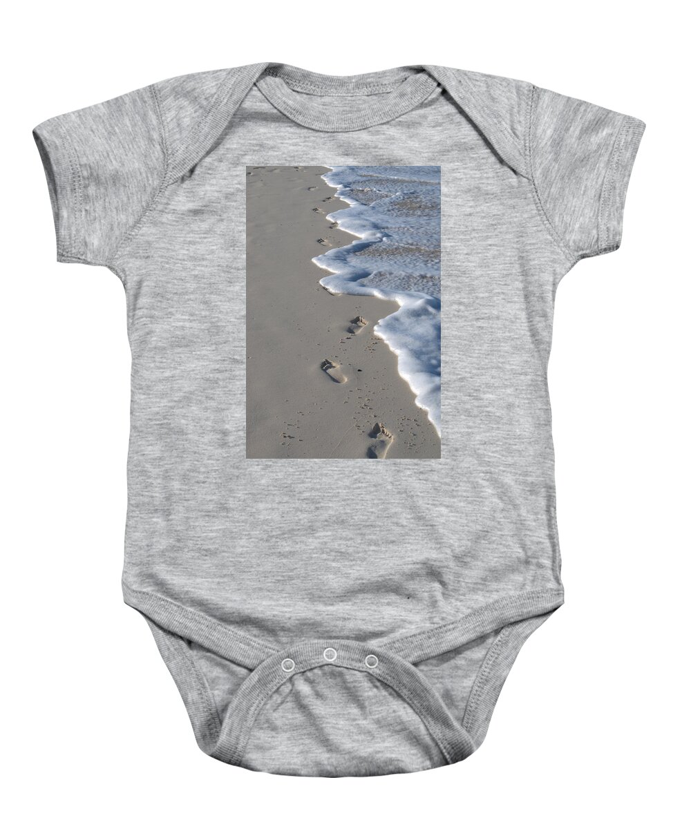 Caribbean Baby Onesie featuring the photograph Footprints in the Sand by Caroline Stella