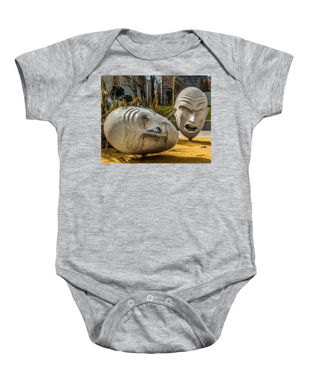 Art Baby Onesie featuring the photograph Giant Heads by Ron Pate