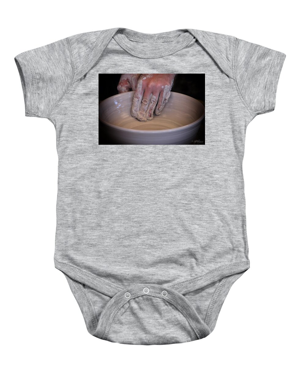 Pottery Baby Onesie featuring the photograph The Potter by Skip Tribby