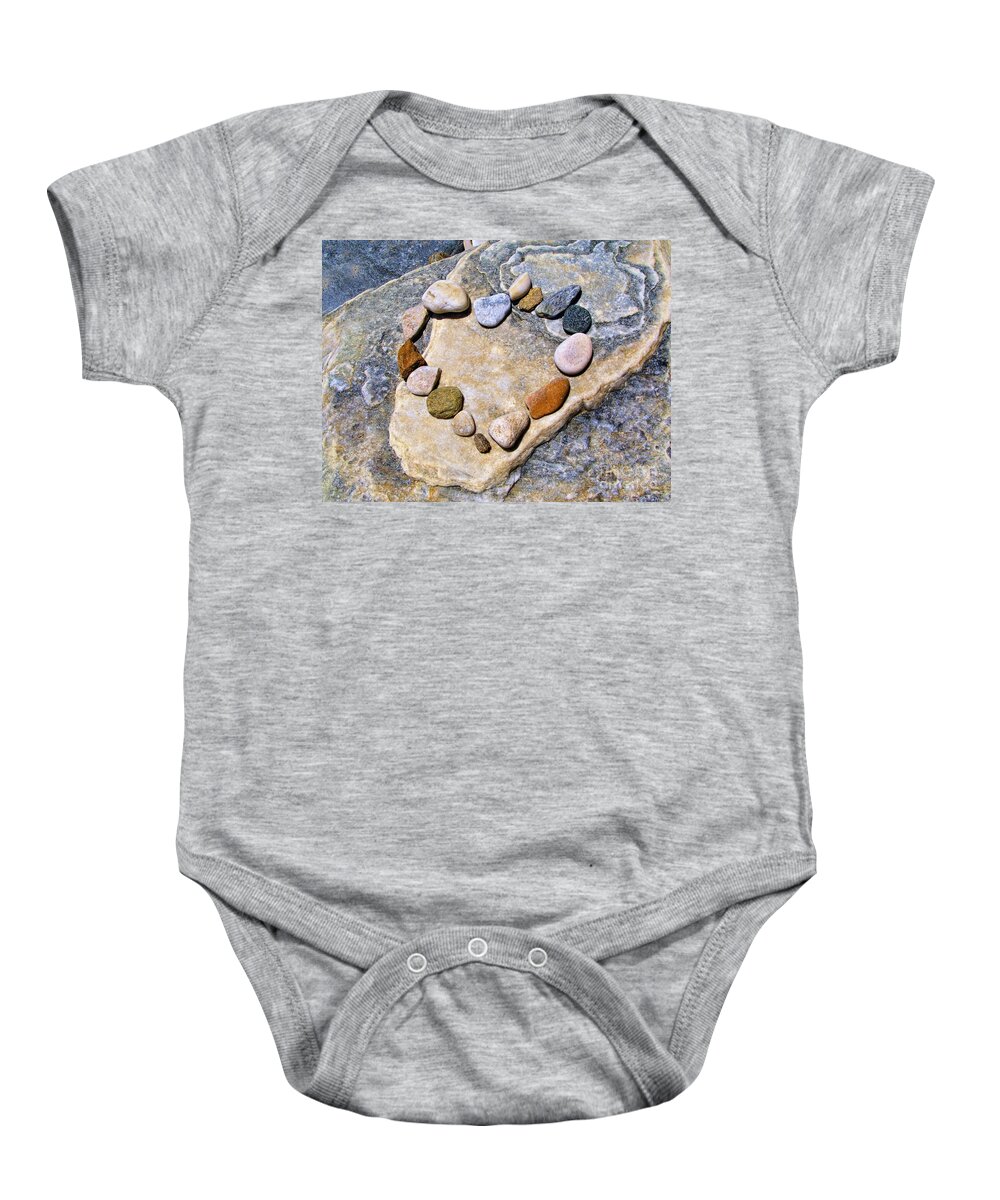Valentines Baby Onesie featuring the photograph Heart and stones by Daliana Pacuraru