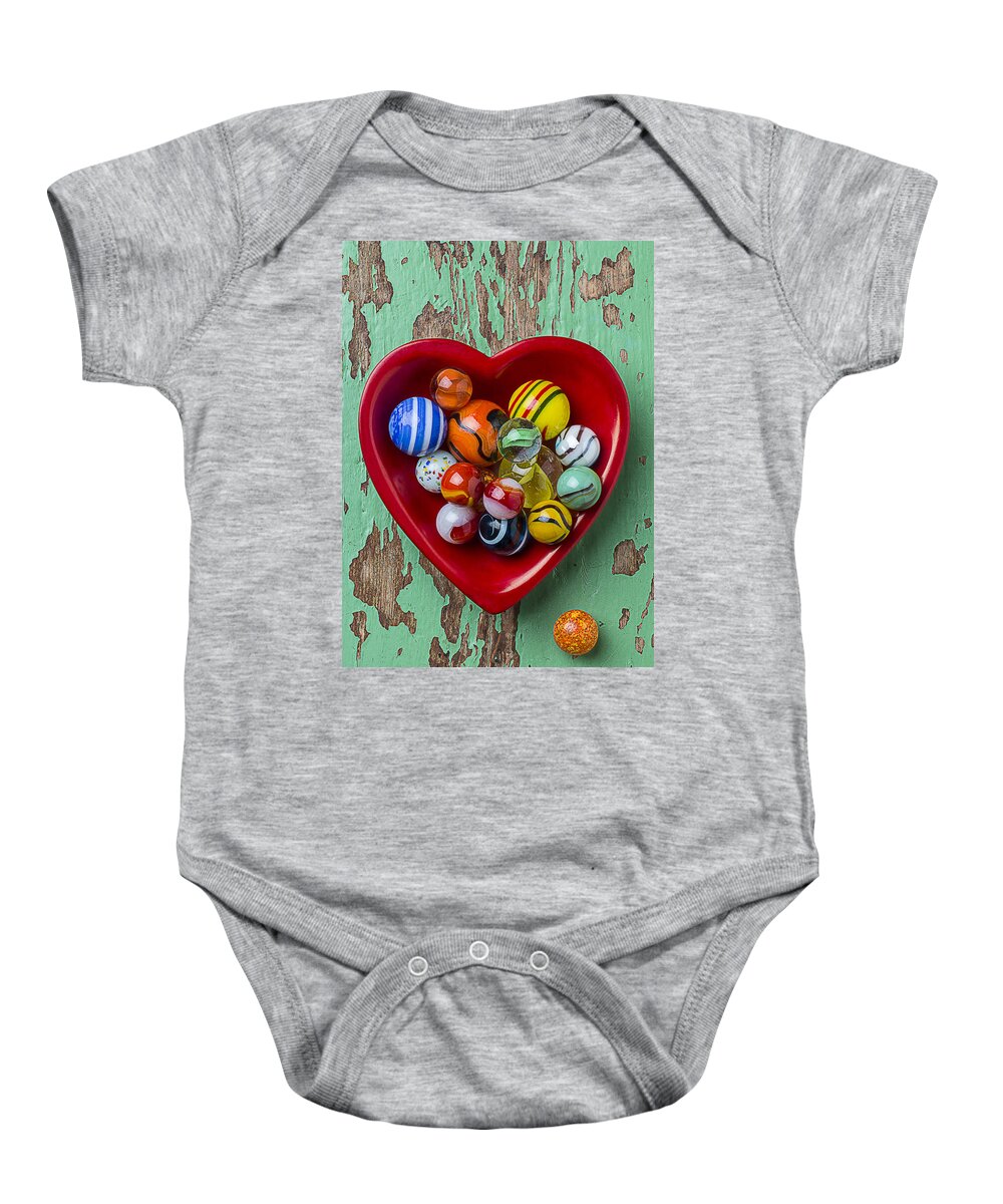 Heart Baby Onesie featuring the photograph Heart Dish With Marbles by Garry Gay