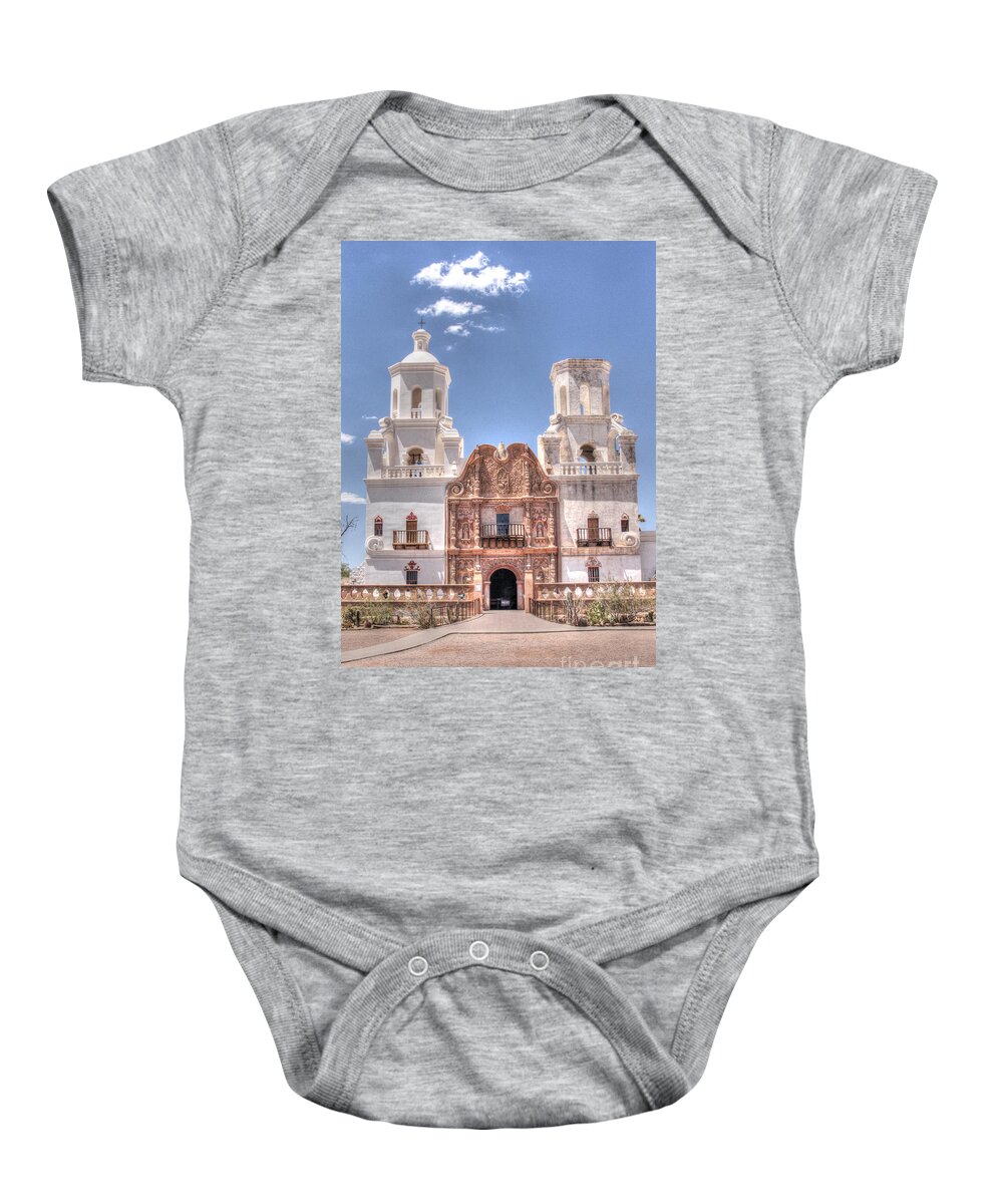 Arizona Baby Onesie featuring the photograph Mission San Xavier by Bob Hislop