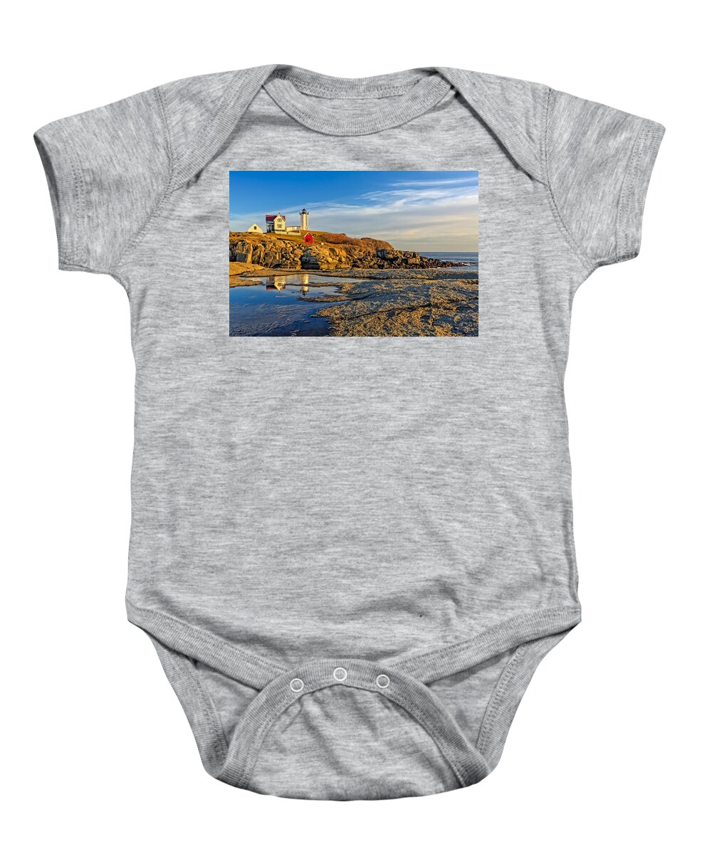 Nubble Lighthouse Baby Onesie featuring the photograph Nubble Lighthouse Reflections by Susan Candelario