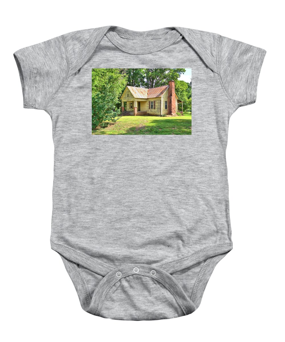10345 Baby Onesie featuring the photograph Old Yellow House by Gordon Elwell