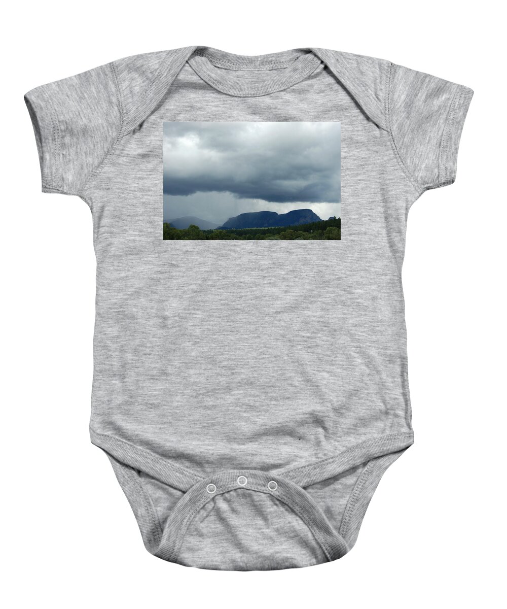 Dakota Baby Onesie featuring the photograph Rain on Hermit's Peak by Greni Graph