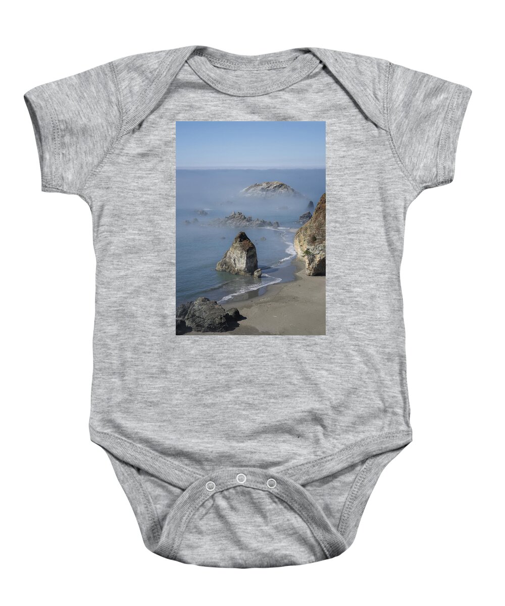 Rainbow Rock Baby Onesie featuring the photograph Rainbow Rock by Betty Depee