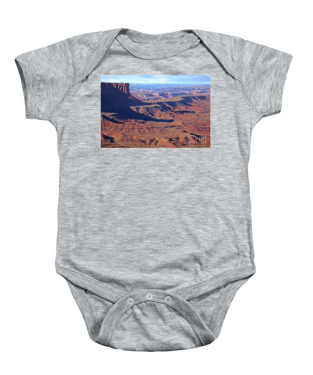 Utah Baby Onesie featuring the photograph Robber's Roost by Jim Garrison