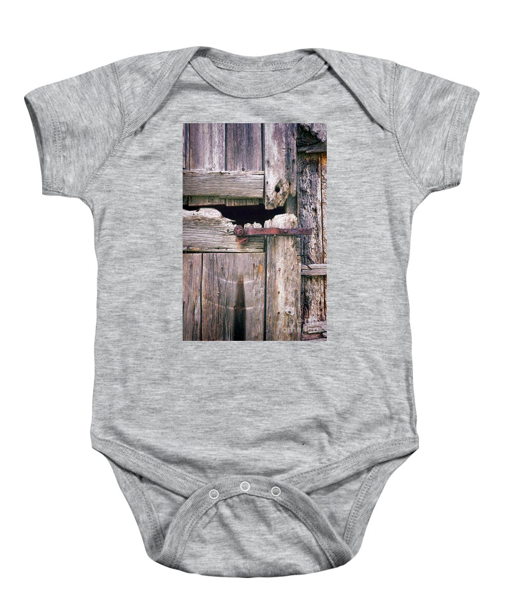 Door Baby Onesie featuring the photograph Rustic Barn Door by Jill Battaglia