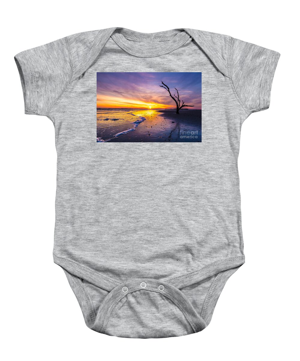 Charleston Sunset Baby Onesie featuring the photograph Sun drops behind Bird Key - Folly Beach SC by Donnie Whitaker