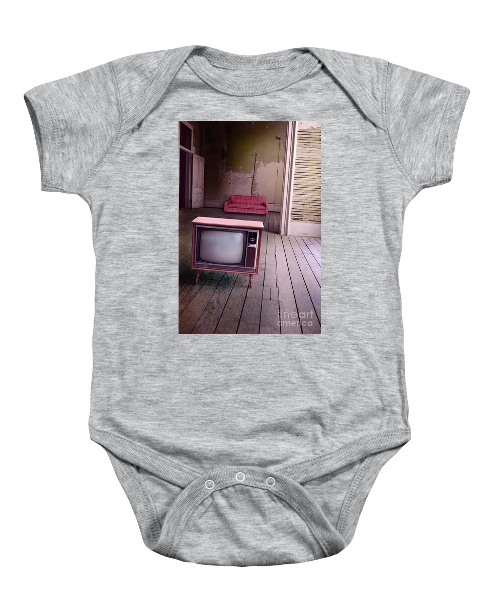 Television Baby Onesie featuring the photograph Television in old abandoned building by Jill Battaglia