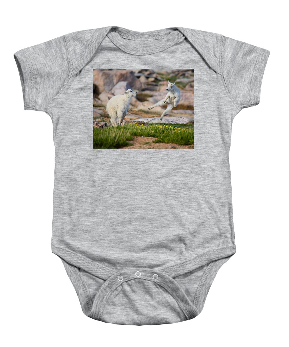 Baby Goat; Mountain Goat Baby; Dance; Dancing; Happy; Joy; Nature; Baby Goat; Mountain Goat Baby; Happy; Joy; Nature; Brothers Baby Onesie featuring the photograph The Dance of Joy by Jim Garrison