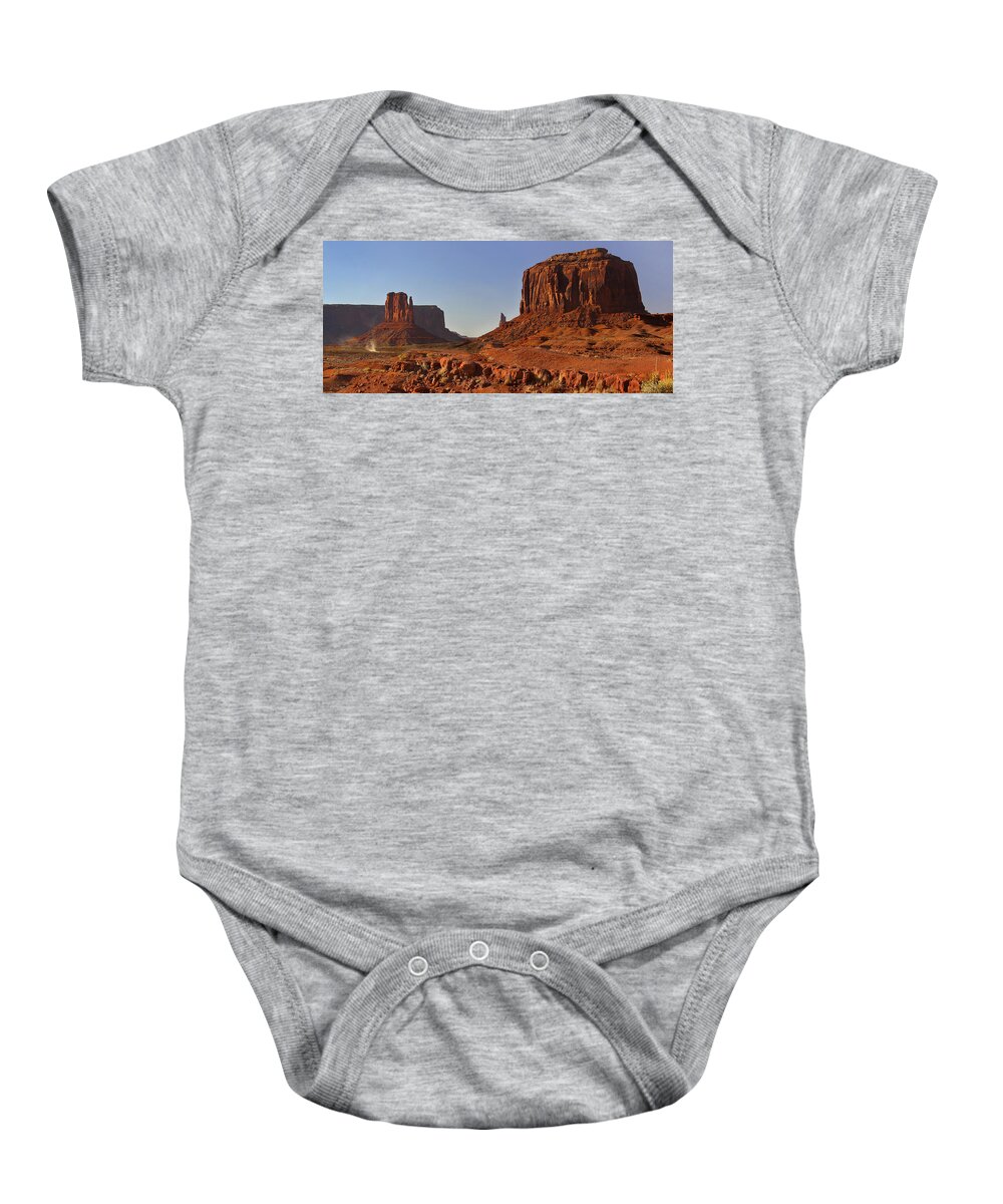 Desert Baby Onesie featuring the photograph The Dusty Trail - Monument Valley by Mike McGlothlen