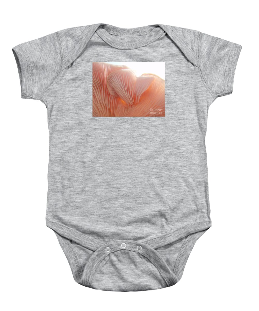Toadstool Baby Onesie featuring the photograph The Flukes of a Toadstool by Mary Deal