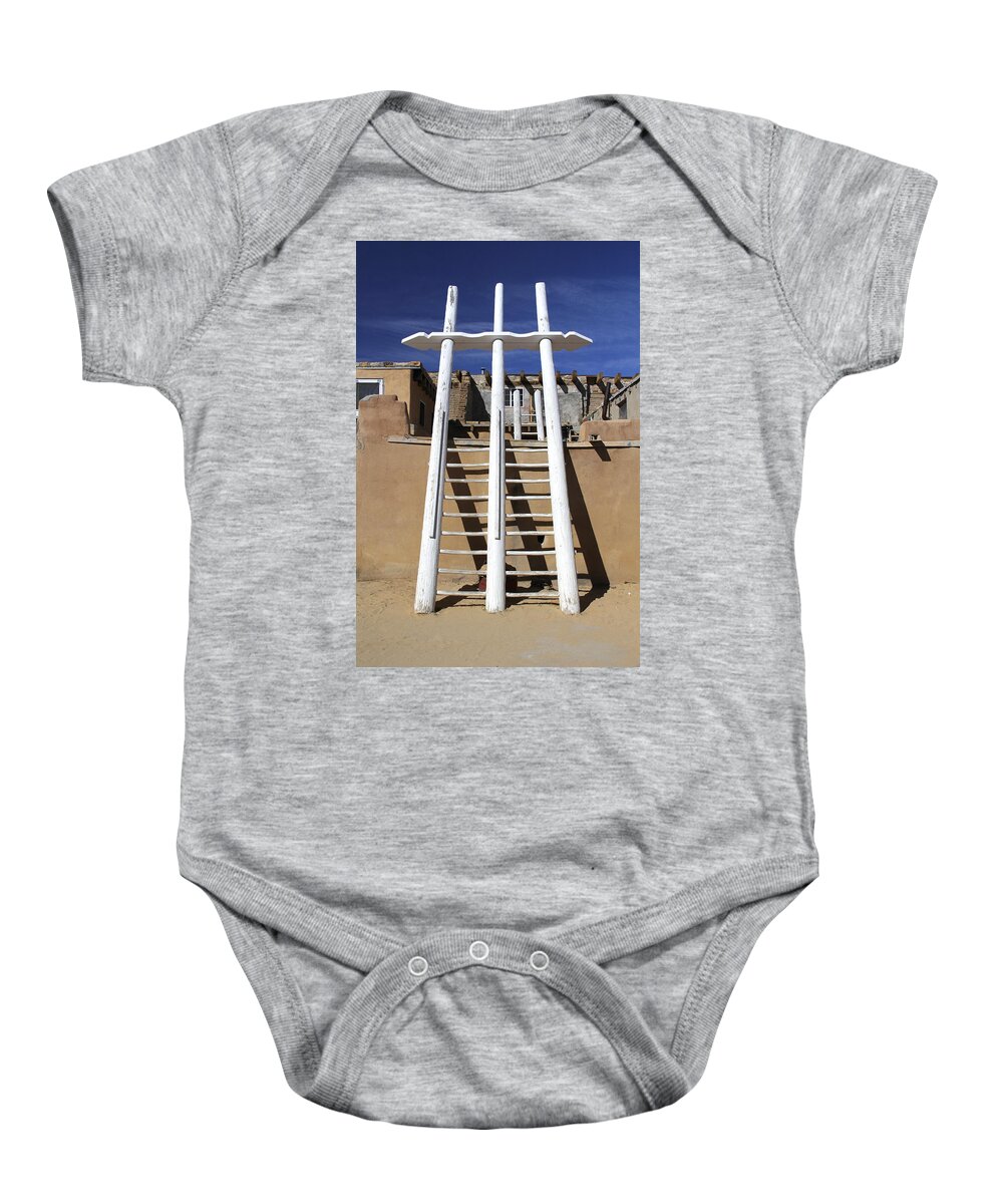Acoma Pueblo Baby Onesie featuring the photograph The Ladder Acoma Pueblo by Mike McGlothlen
