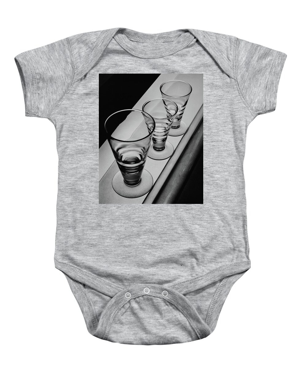 Home Accessories Baby Onesie featuring the photograph Three Glasses On A Shelf by Martin Bruehl