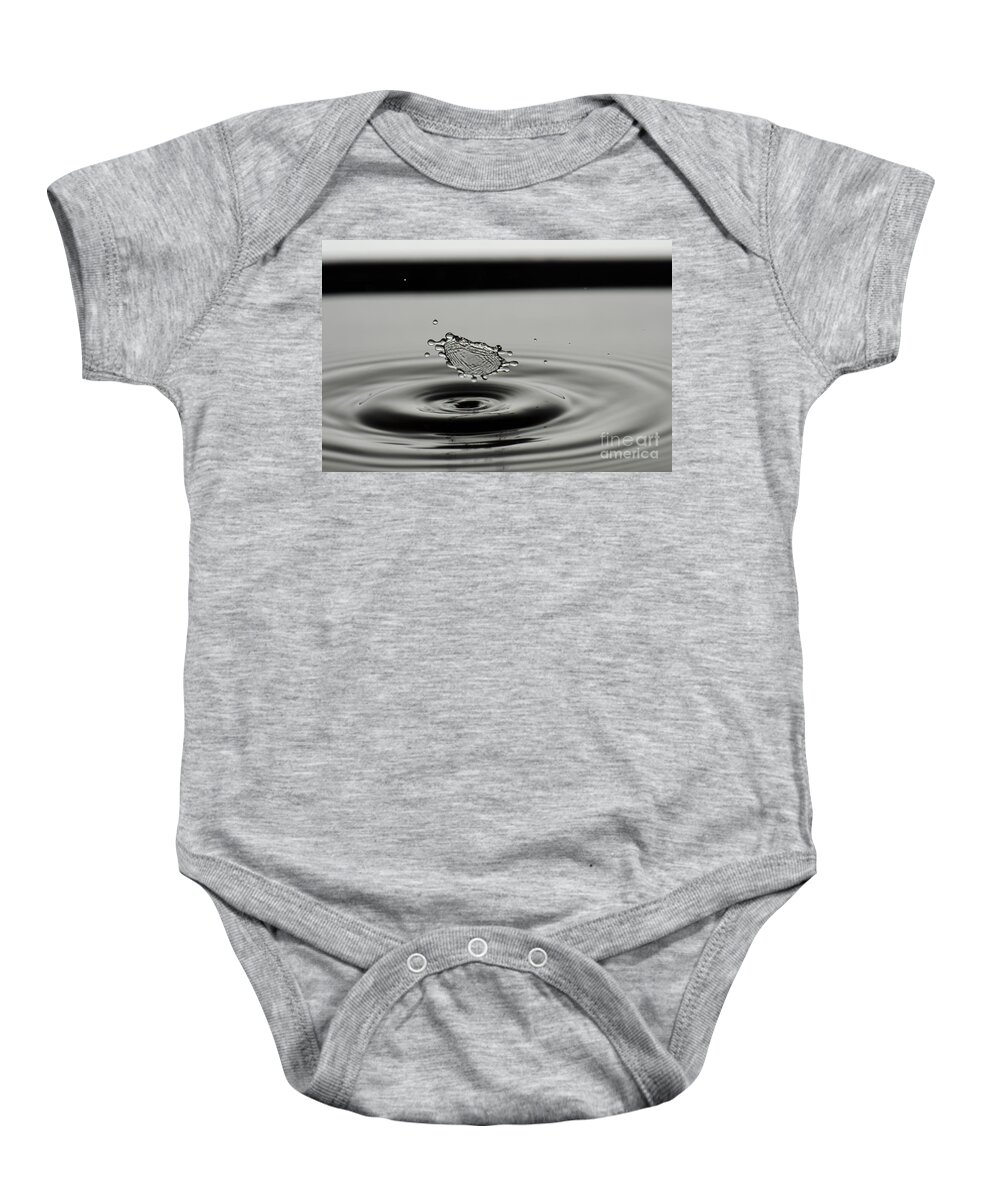 Stop Motion Baby Onesie featuring the photograph High-speed flash photograph liquid coronet. #1 by Guy Viner