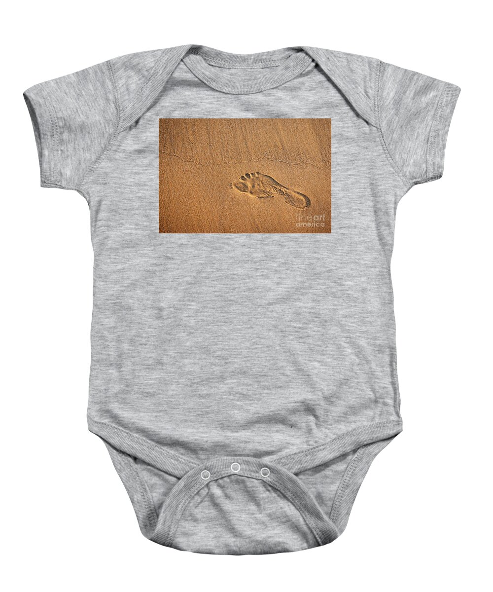 Activity Baby Onesie featuring the photograph Foot Print by Carlos Caetano