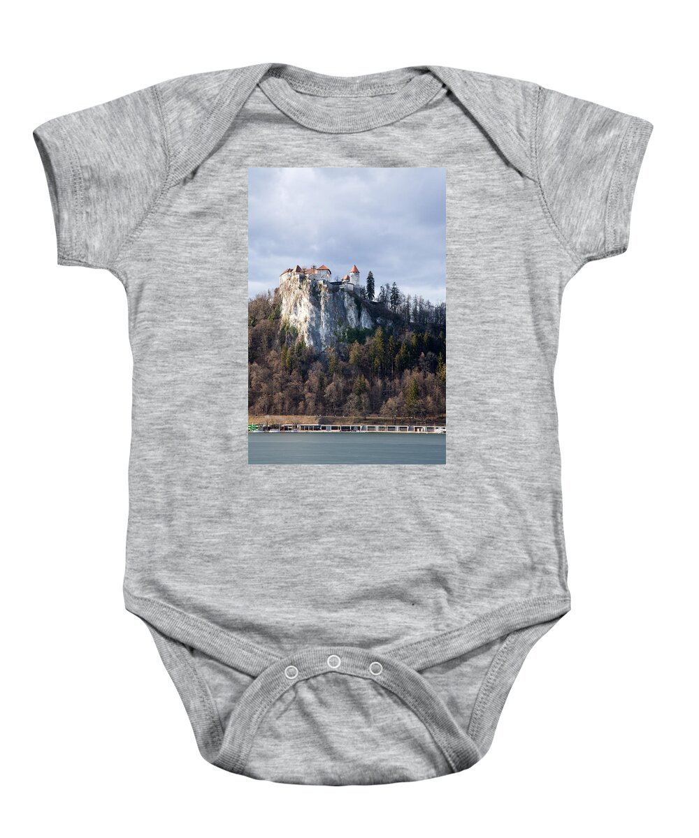 Bled Baby Onesie featuring the photograph Lake Bled castle by Ian Middleton