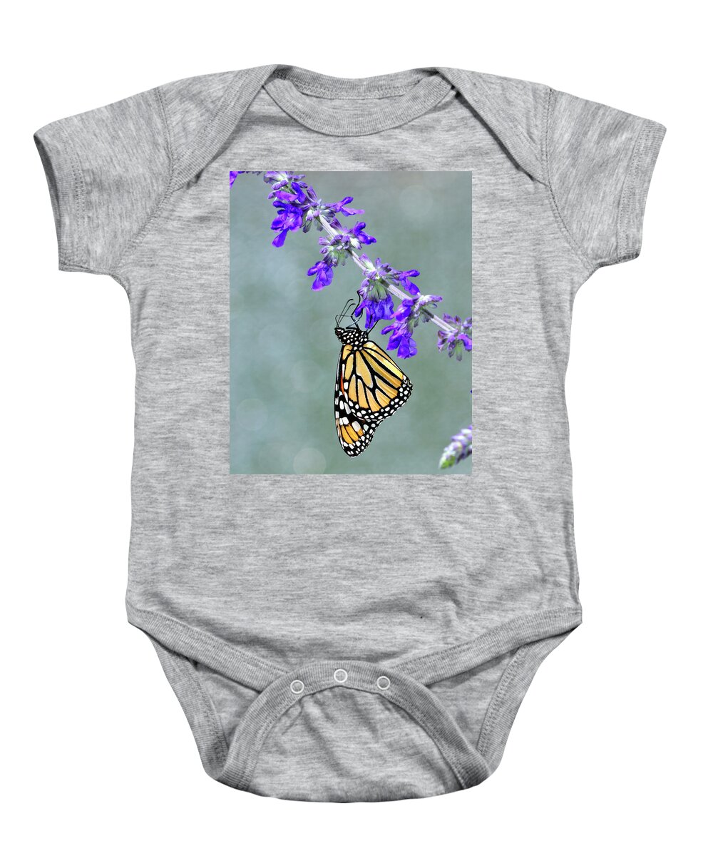 Monarch Baby Onesie featuring the photograph Monarch on Purple by Bill Dodsworth