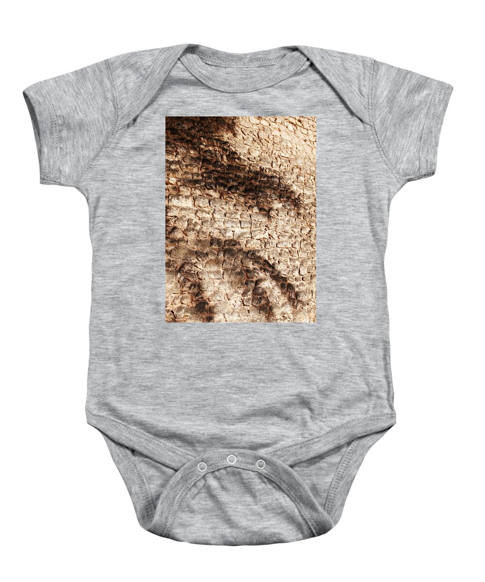 Palmera Baby Onesie featuring the photograph Palm fragment by Agusti Pardo Rossello