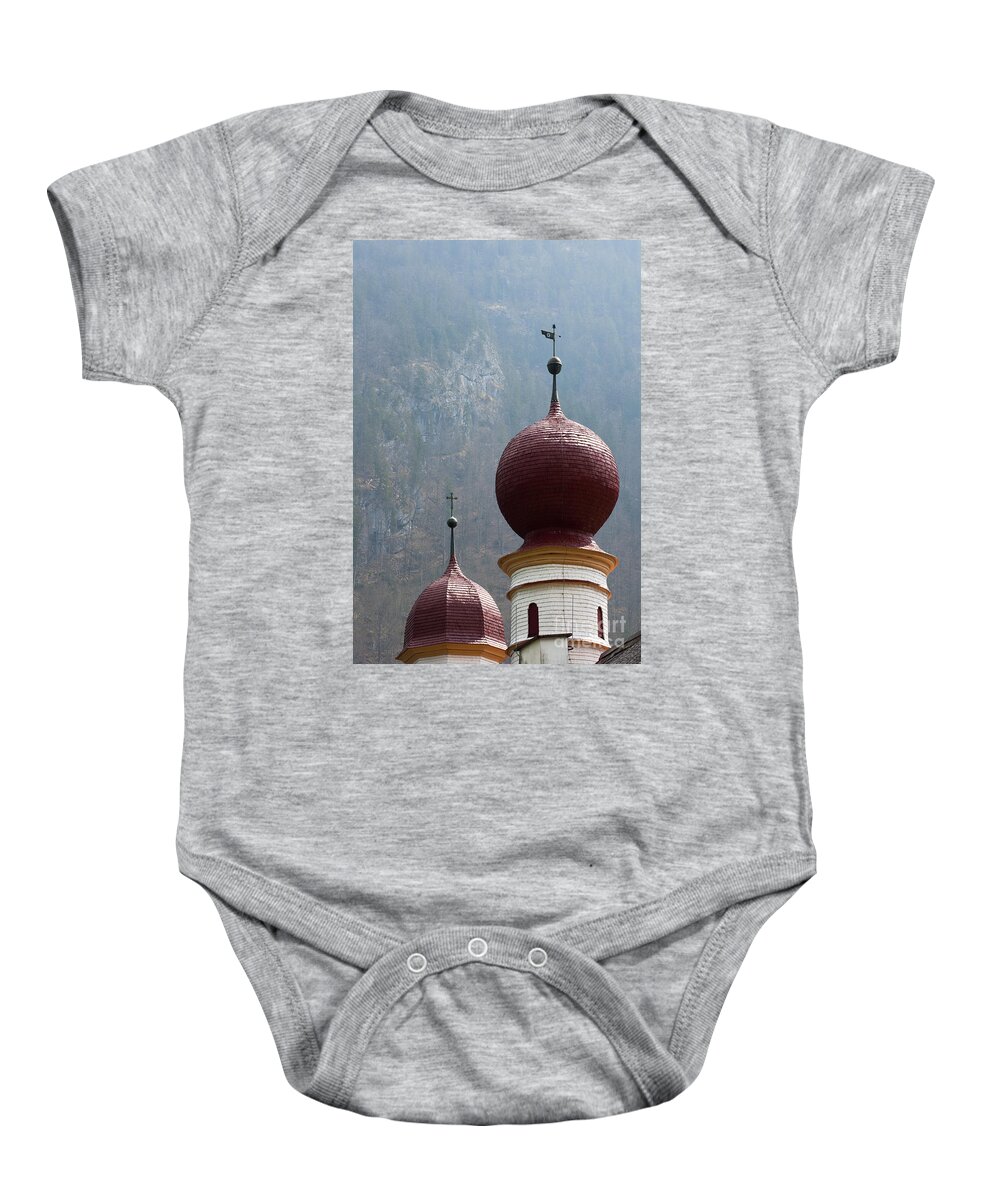 Alps Baby Onesie featuring the photograph St. Bartholomew church by Andrew Michael