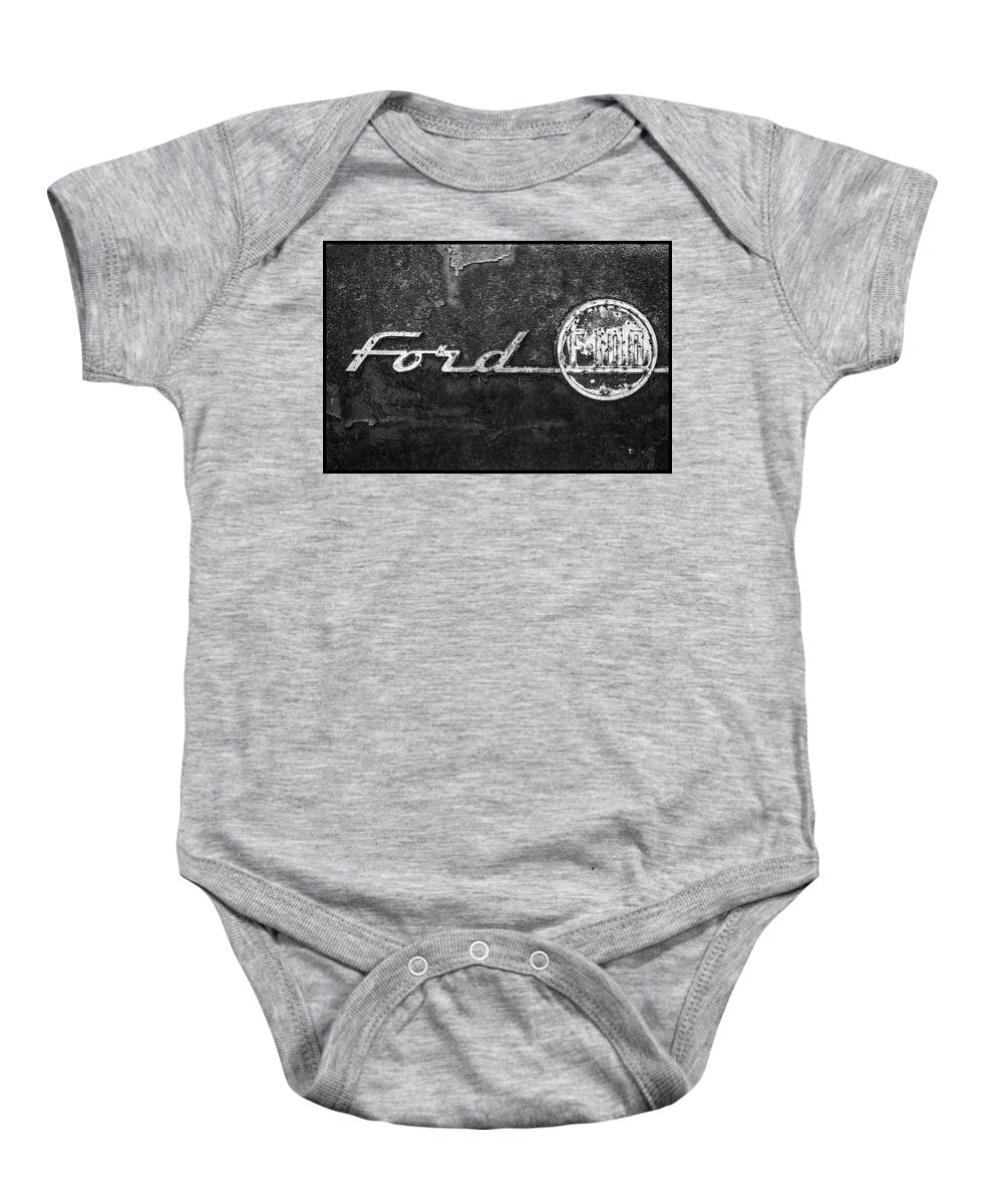 Ford F-100 Emblem Baby Onesie featuring the photograph Ford F-100 Emblem On A Rusted Hood #1 by Matthew Pace