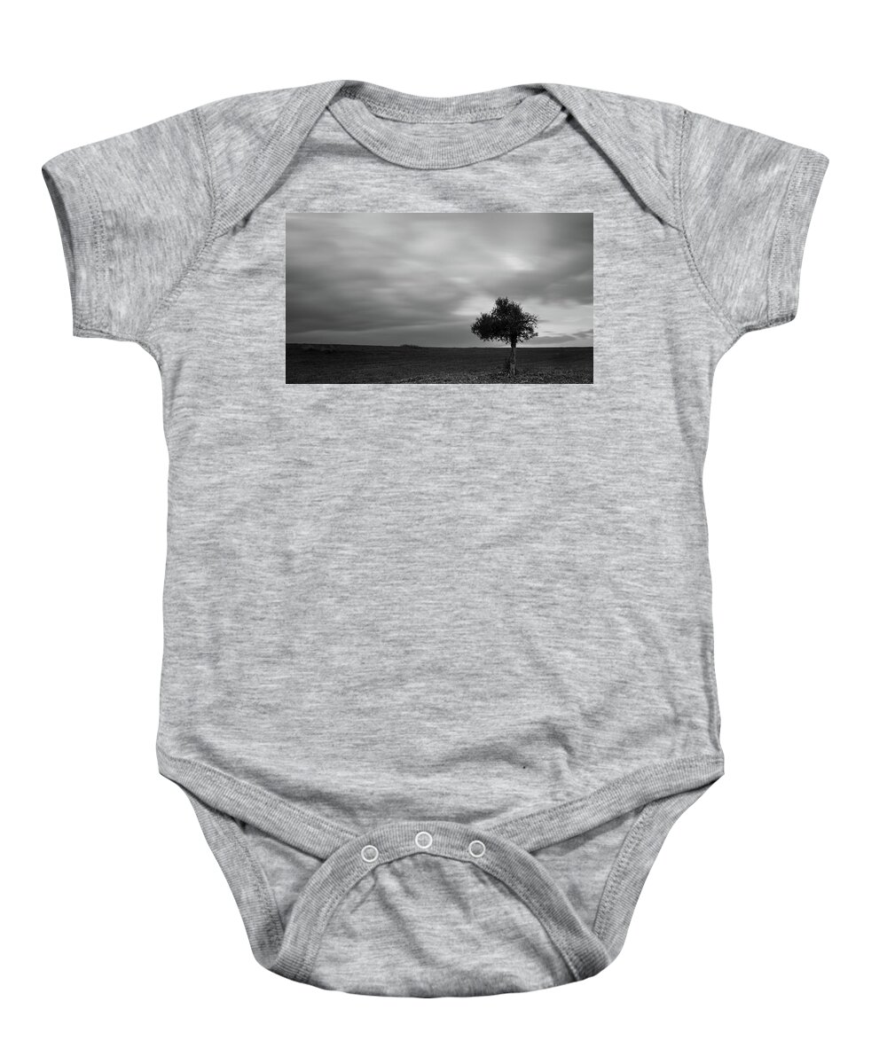 Olive Tree Baby Onesie featuring the photograph Lonely Olive tree in a green field and moving clouds #1 by Michalakis Ppalis