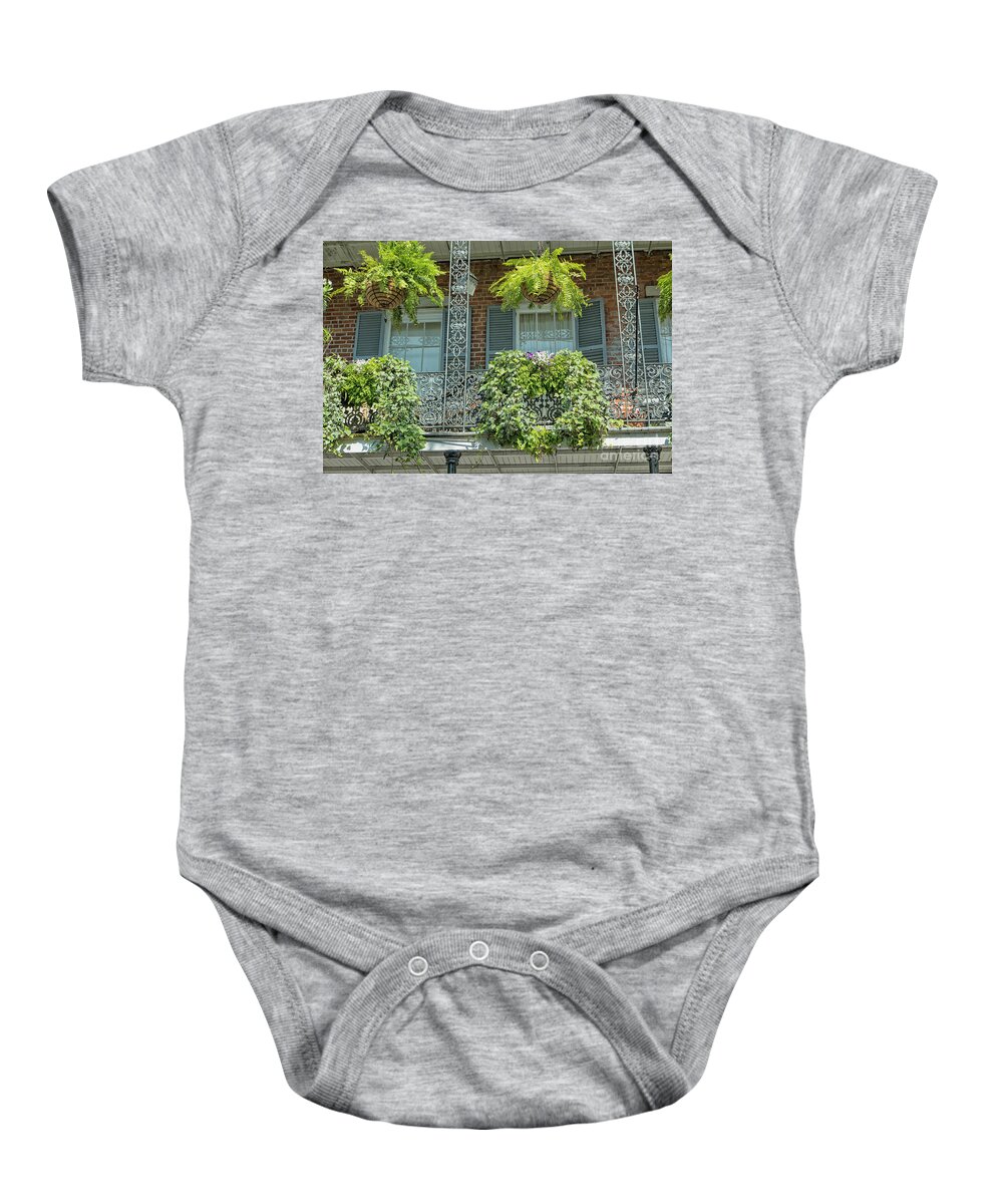 America Baby Onesie featuring the photograph Plants on balconies in New Orleans, USA by Patricia Hofmeester