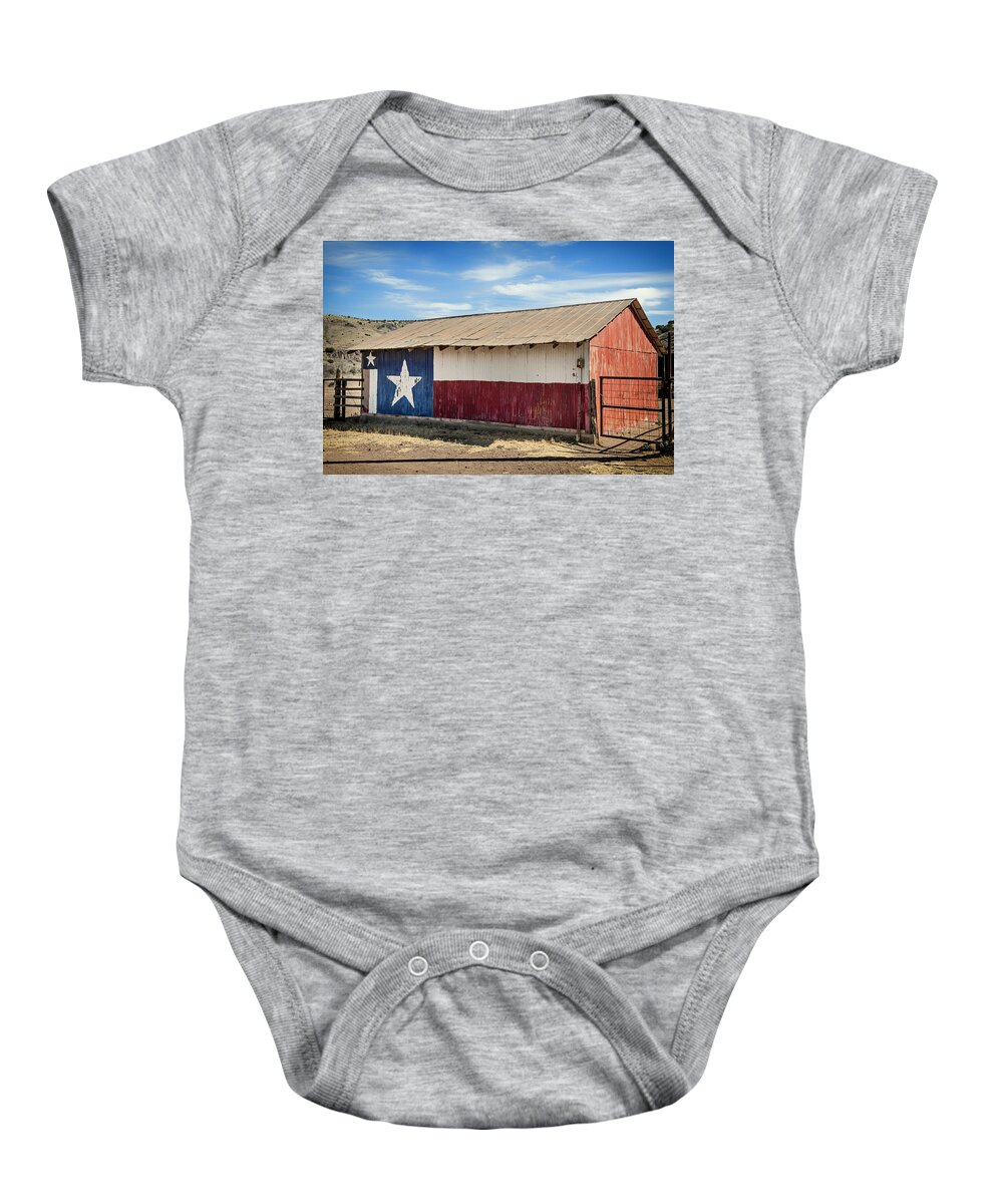 Texas Baby Onesie featuring the photograph Texas State Flag on a Texan Ranch Barn #1 by Mountain Dreams
