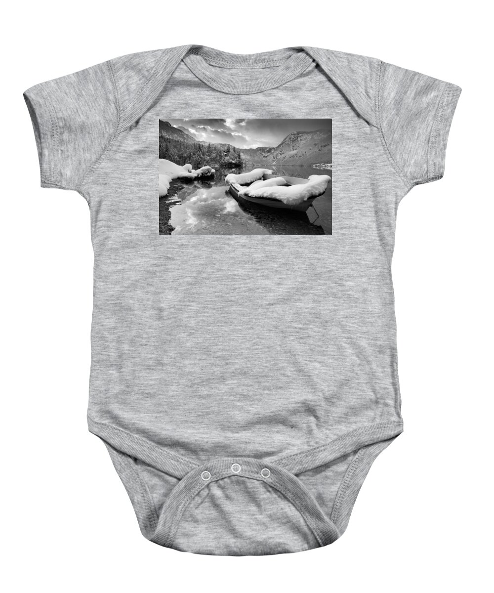 Bohinj Baby Onesie featuring the photograph Snow covered boat on Lake Bohinj in Winter #2 by Ian Middleton