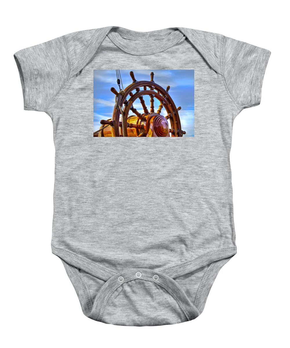 Boats Baby Onesie featuring the photograph The Helm #1 by Debra and Dave Vanderlaan
