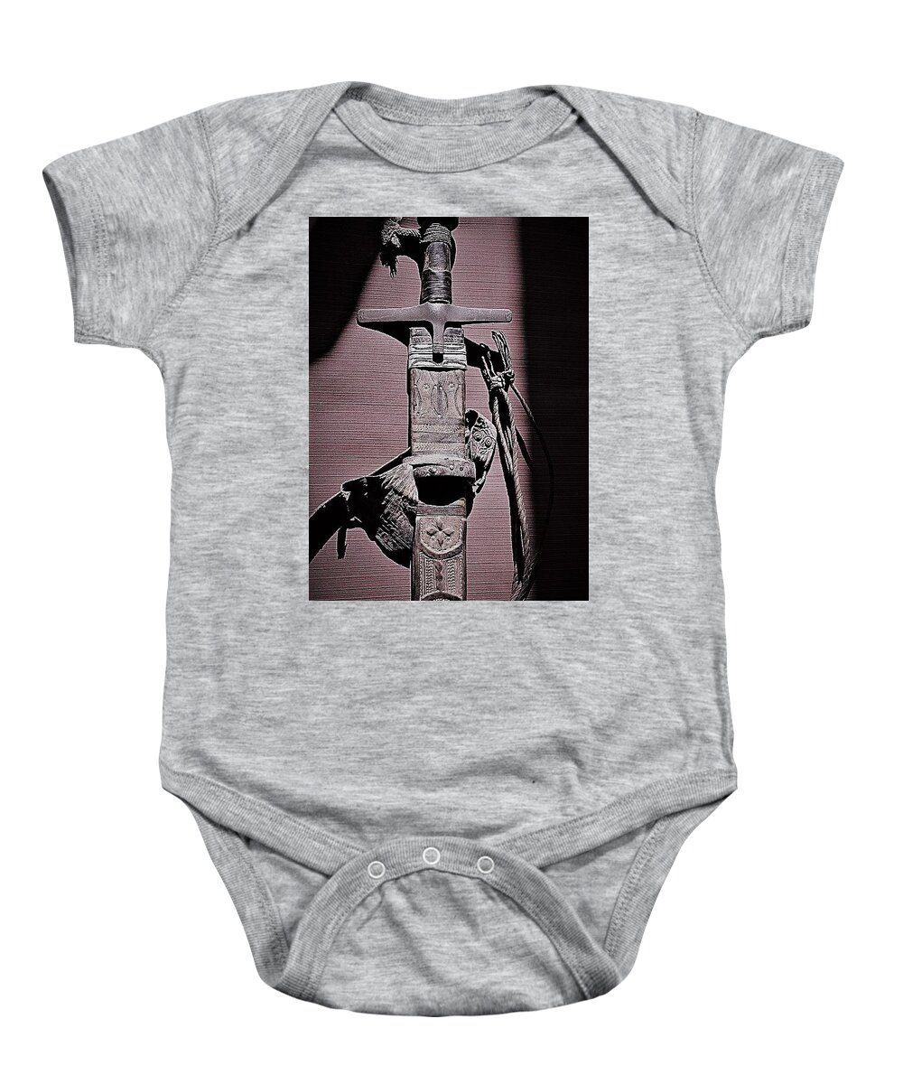 Sword Baby Onesie featuring the photograph A Warriors Sword by John Glass