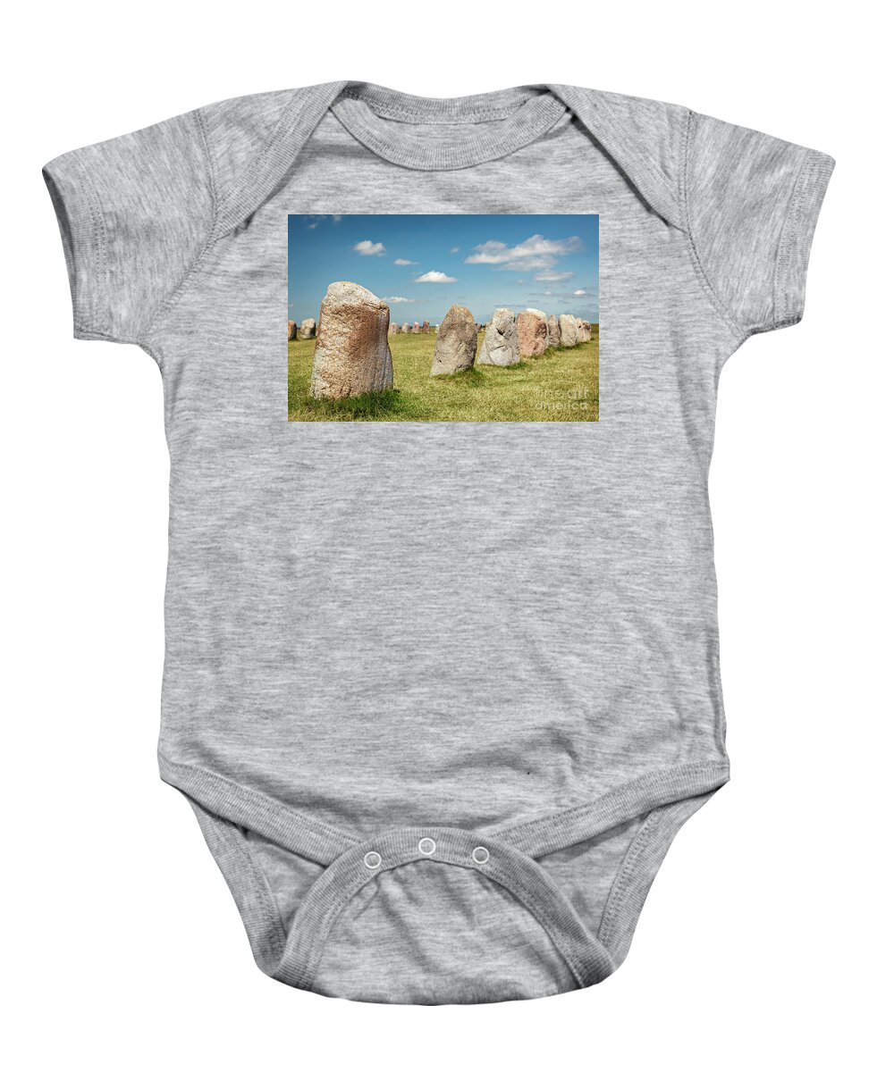 Megalithic Baby Onesie featuring the photograph Ale standing stones Sweden by Sophie McAulay