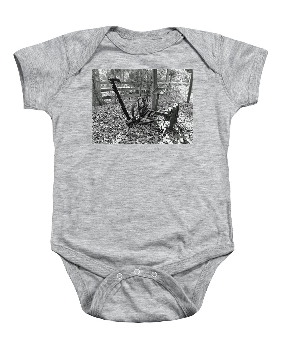  Lawnmower Baby Onesie featuring the photograph Antique Mower B W by D Hackett