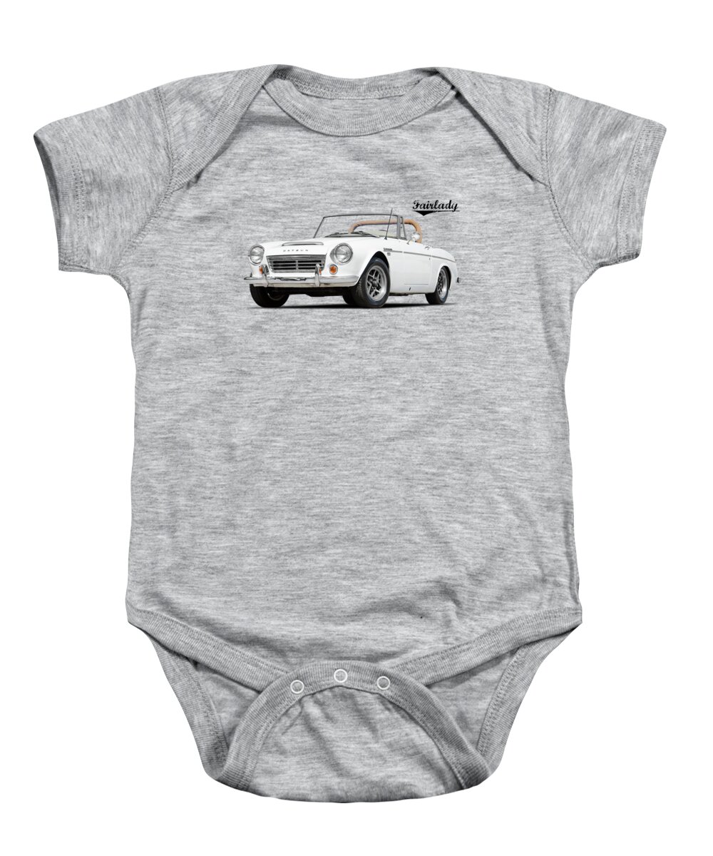 Datsun Fairlady Baby Onesie featuring the photograph The Datsun Fairlady by Mark Rogan