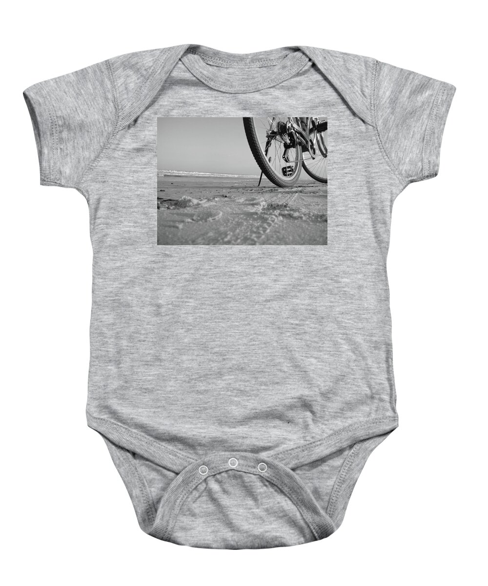 Black And White Print Baby Onesie featuring the photograph Biking To The Beach by WaLdEmAr BoRrErO