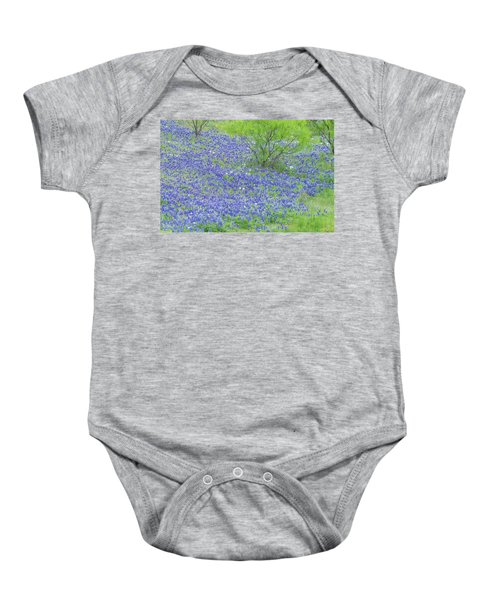 Camera Baby Onesie featuring the photograph Blue bonnets,Poppies and Willow tree. by Usha Peddamatham