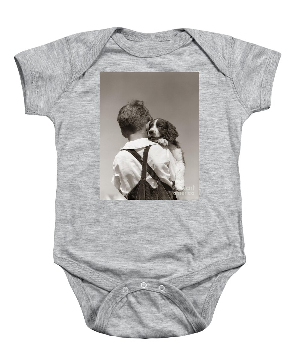 1930s Baby Onesie featuring the photograph Boy With Puppy, C.1930-40s by H Armstrong Roberts ClassicStock