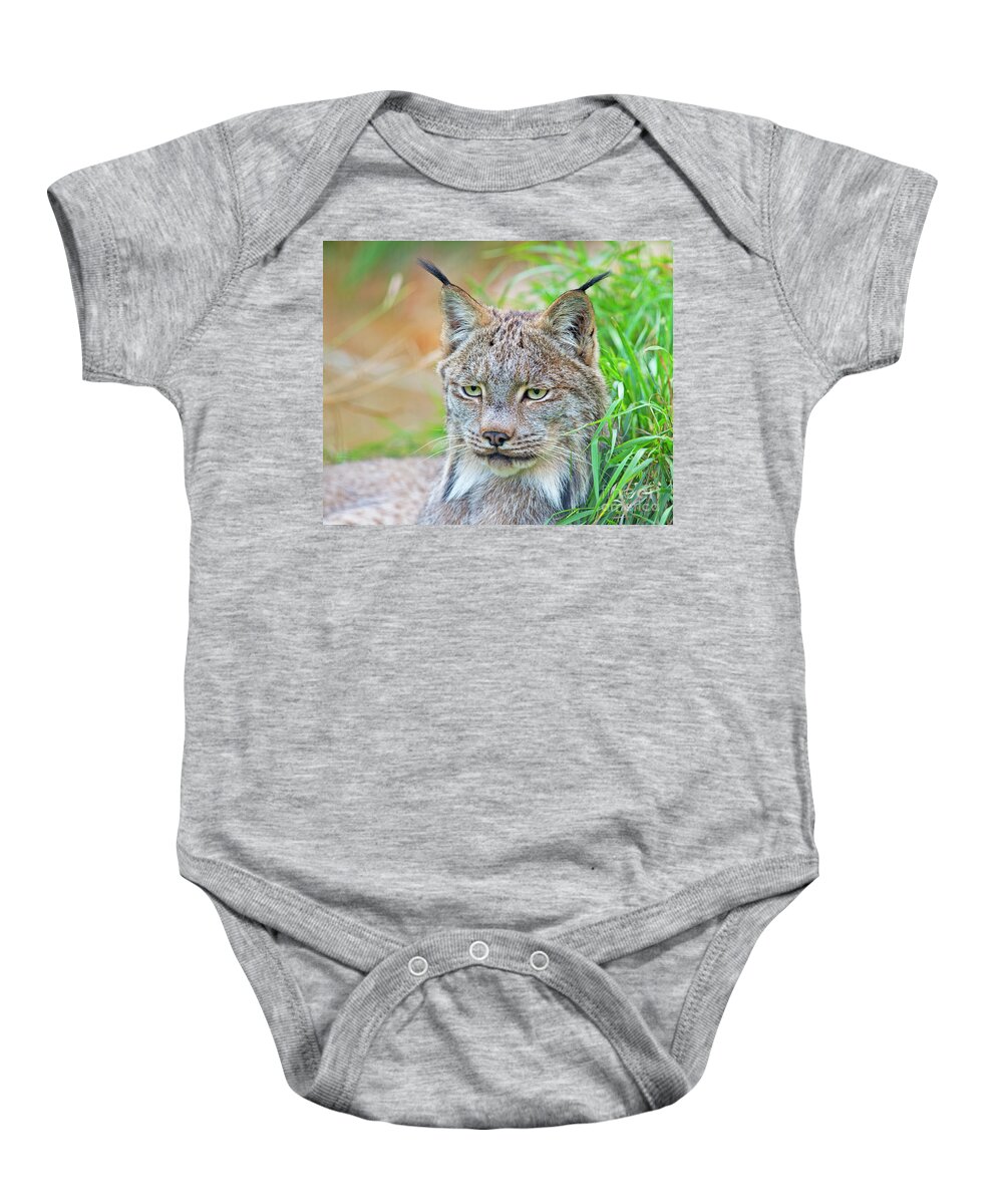 Festblues Baby Onesie featuring the photograph Built in hearing aid.. by Nina Stavlund