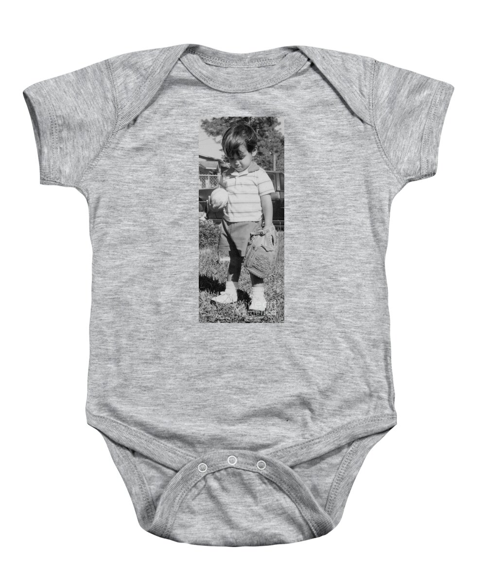 Baseball Baby Onesie featuring the photograph But I wanna play catch some more. by WaLdEmAr BoRrErO