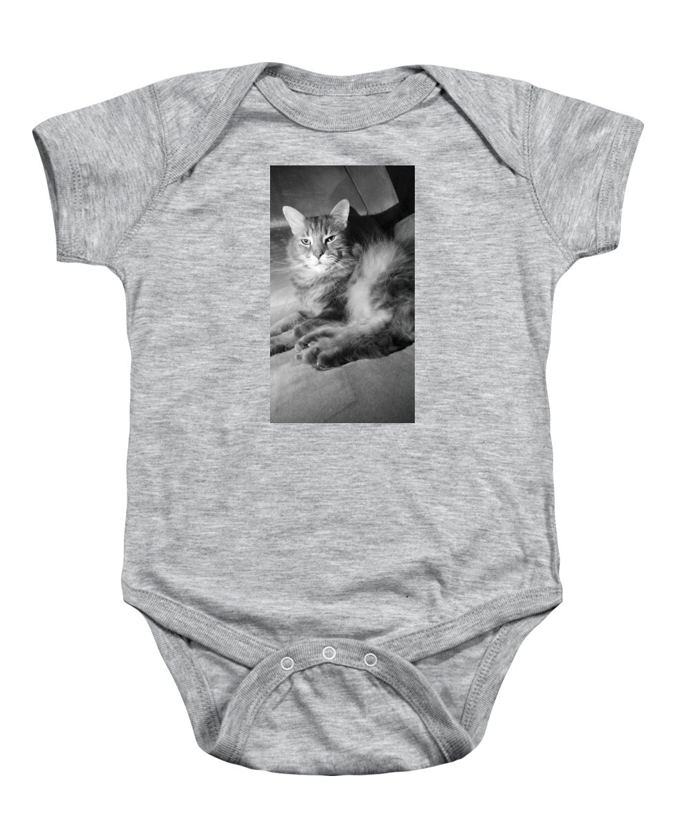 Black Baby Onesie featuring the photograph cat in BW by Kayla Reno