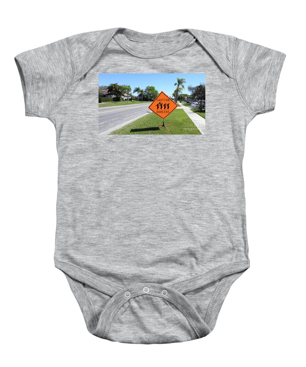 Caution Baby Onesie featuring the photograph Caution Dancers by Larry Mulvehill