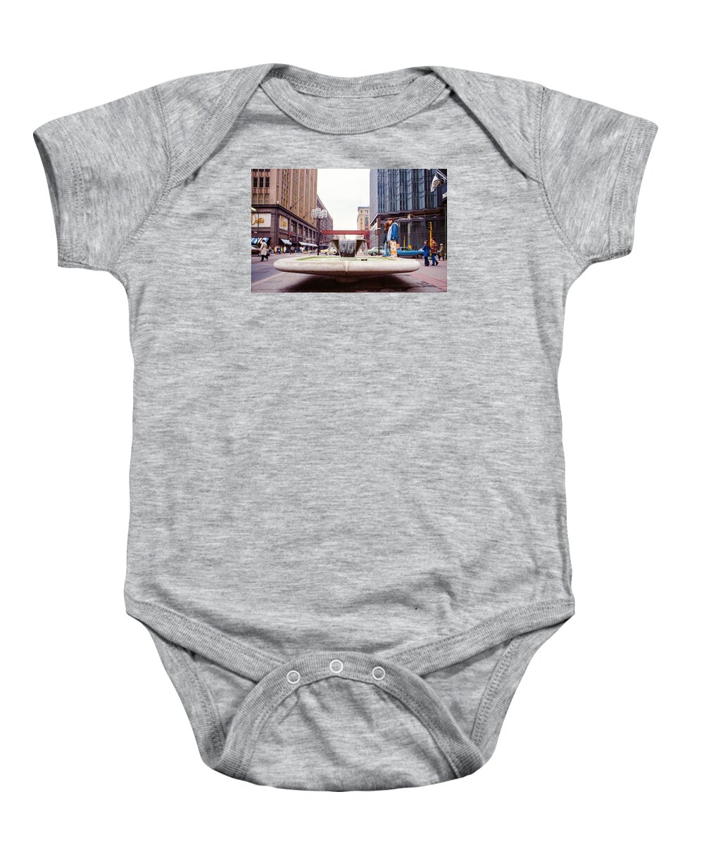 Book Work Baby Onesie featuring the photograph Contemplating the fountain at 8th and Nicollet. by Mike Evangelist