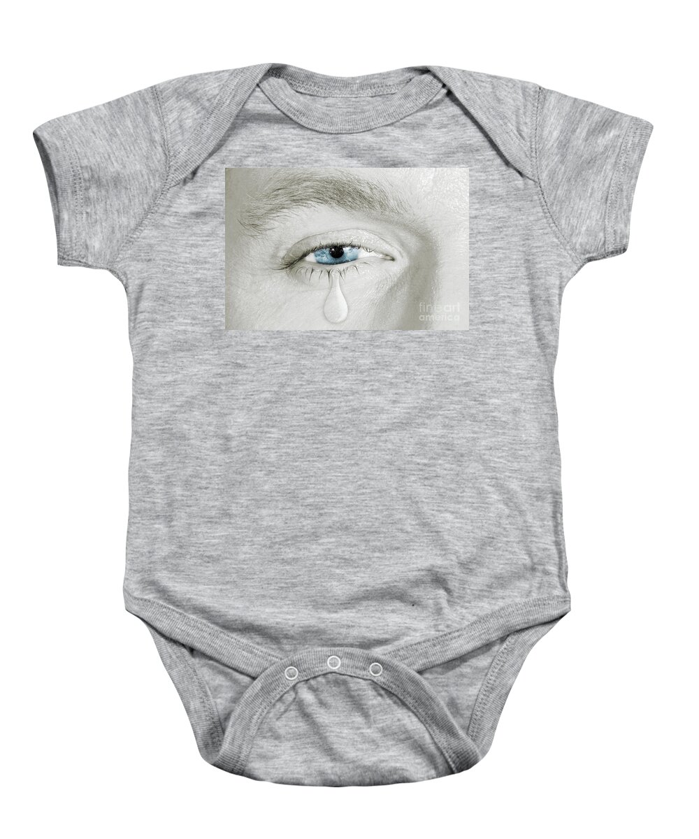 Black And White Baby Onesie featuring the pyrography Crying blue right eye by Benny Marty