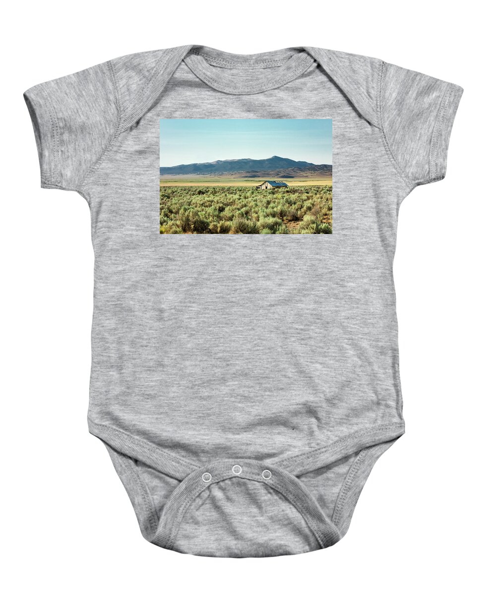 Elko Baby Onesie featuring the photograph Deserted by Todd Klassy