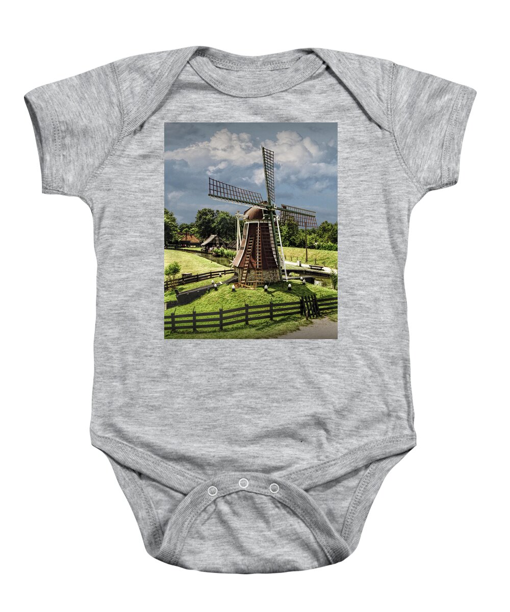 Art Baby Onesie featuring the photograph Dutch Windmill in the Zuiderzee Museum in the Netherlands by Randall Nyhof