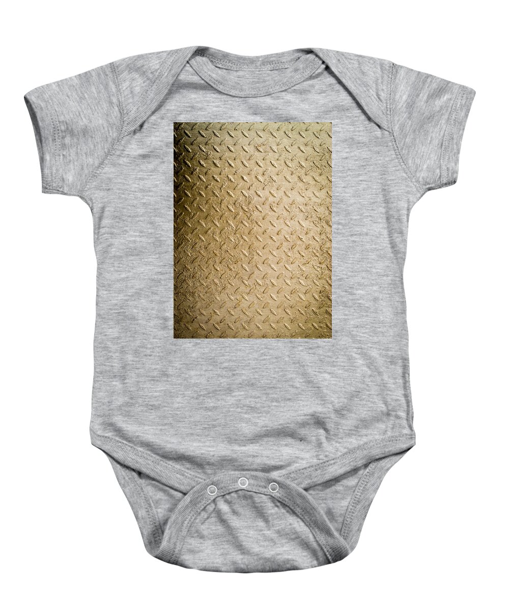 Gold Metal Baby Onesie featuring the photograph Grit of Goldfinger by John Williams