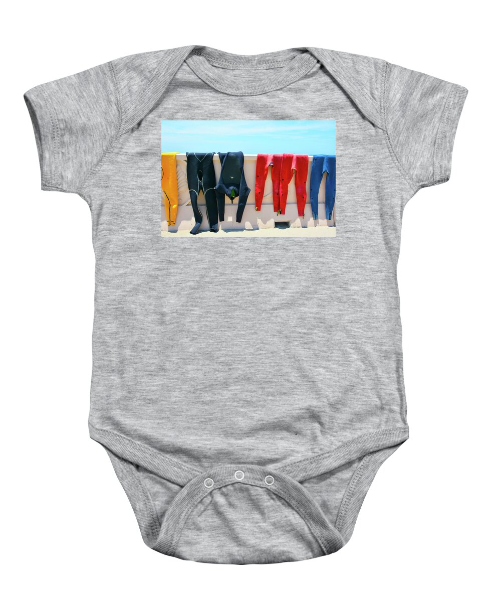 Wetsuits Surfer Colorful Beach Wall Sea Blue Sky Red Yellow Sport Water Ocean Waves Human Form Baby Onesie featuring the photograph Hang Ten by Jennifer Wright